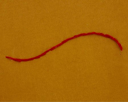 Curved line of backstich from the reverse